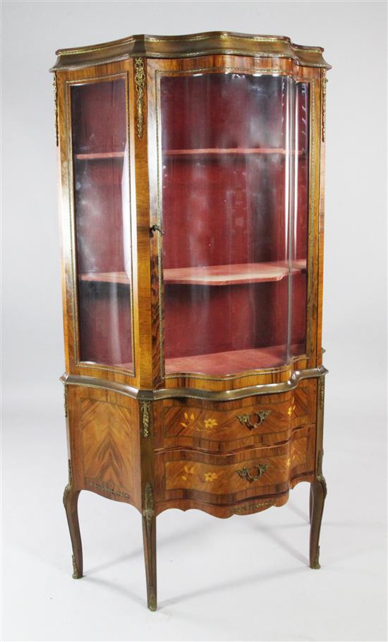 Louis XV style serpentine gilt mounted and marquetry inlaid vitrine(-)